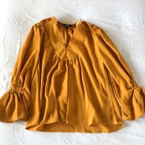 Golden yellow long-sleeve blouse